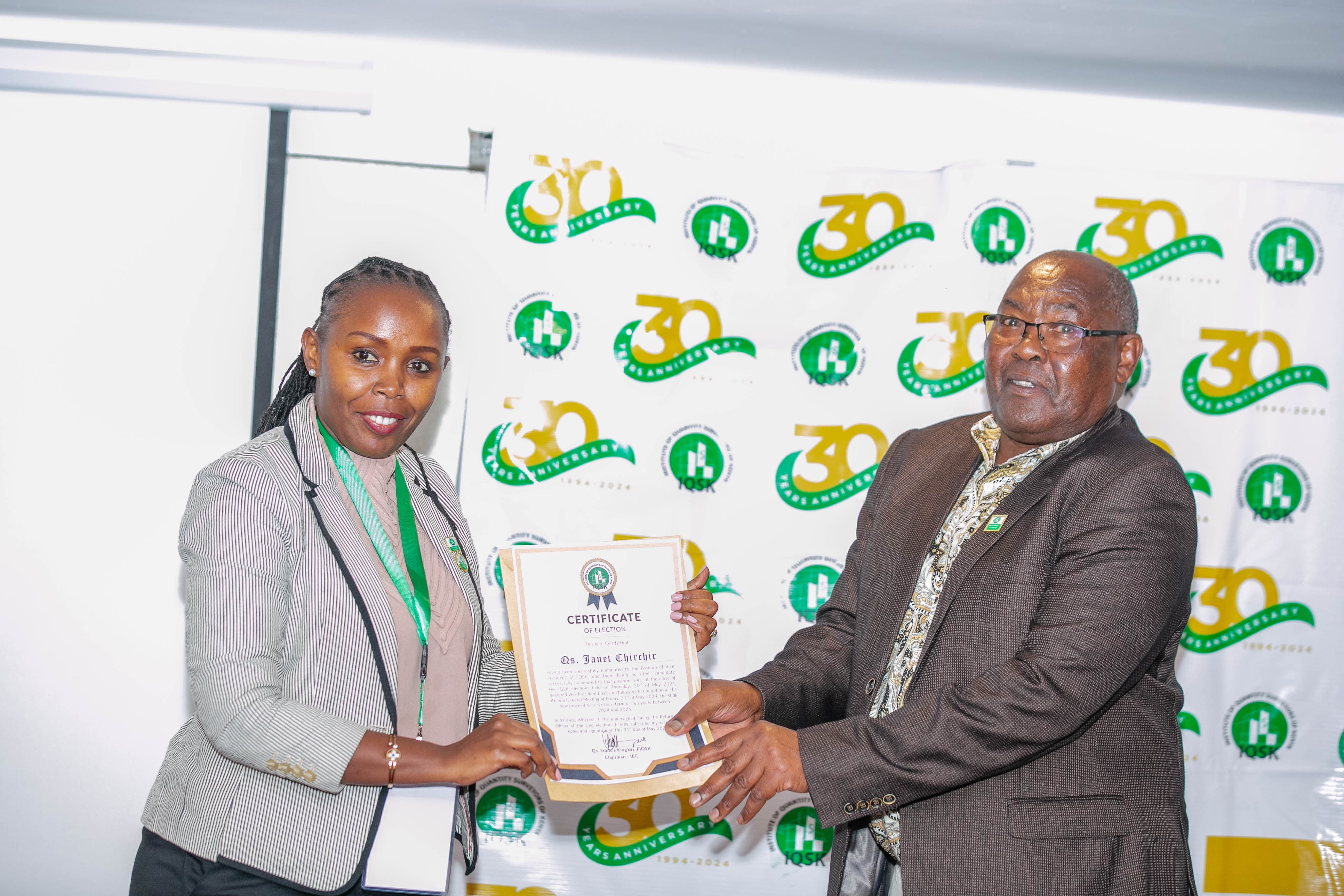 Qs. Janet Chirchir receives her Certificate of Election as Vice President from Commission Chairperson Qs. Francis King'ori