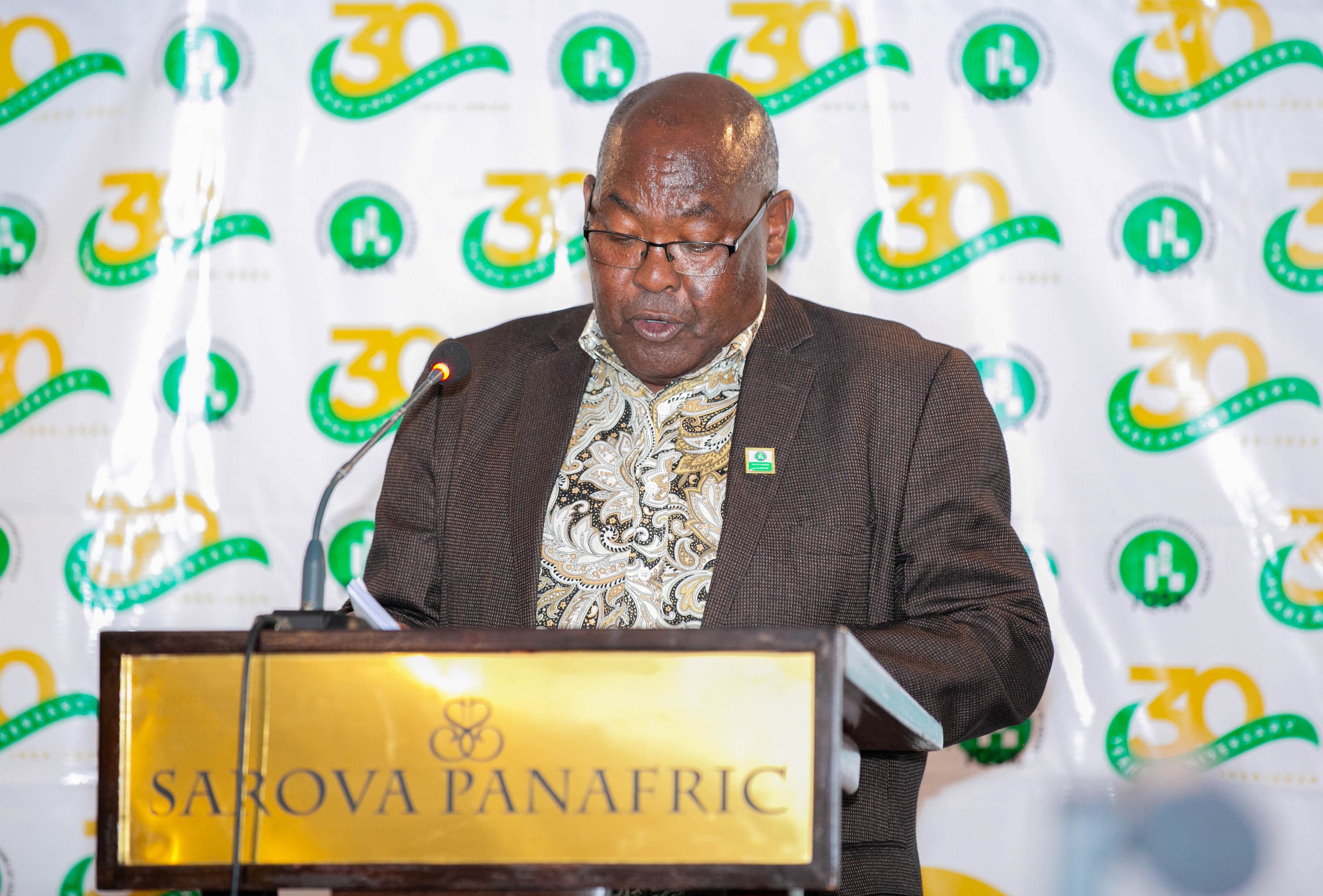 Commission Chairperson Qs. Francis King'ori, FIQSK makes his presentation during the 2024 Annual General Meeting at Sarova Panafric