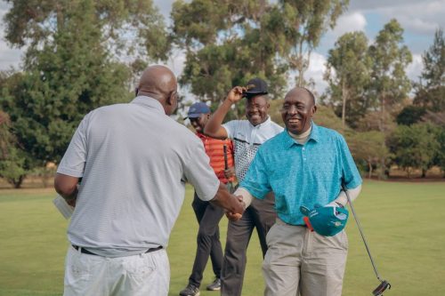 Players having a chat at the IQSK 28th Golf Tournament